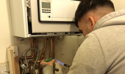 The London Plumbing Company Gas Safe registered engineer carrying out a boiler repair